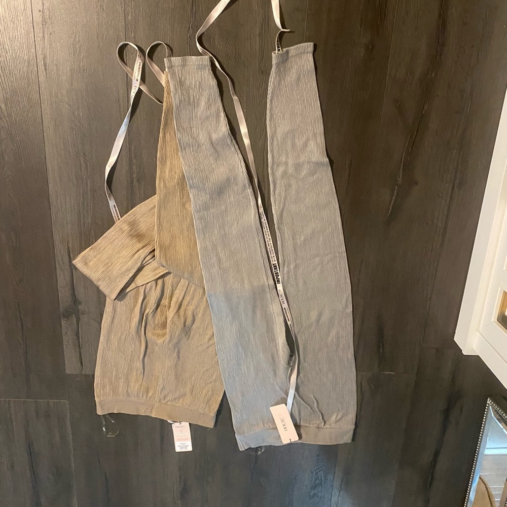 Two house of cb derriere grey and mocha leggings, size large, new